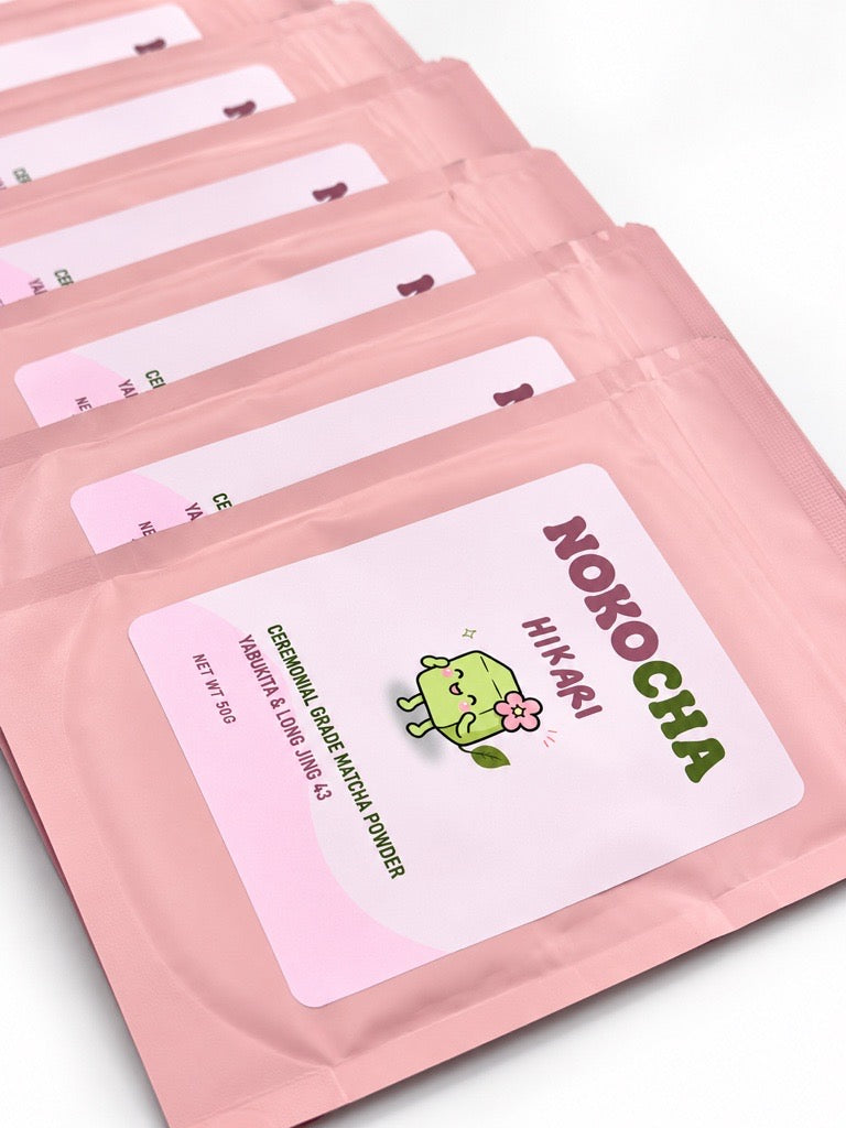 Row of Nokocha Hikari ceremonial grade matcha pouches, front labels showing